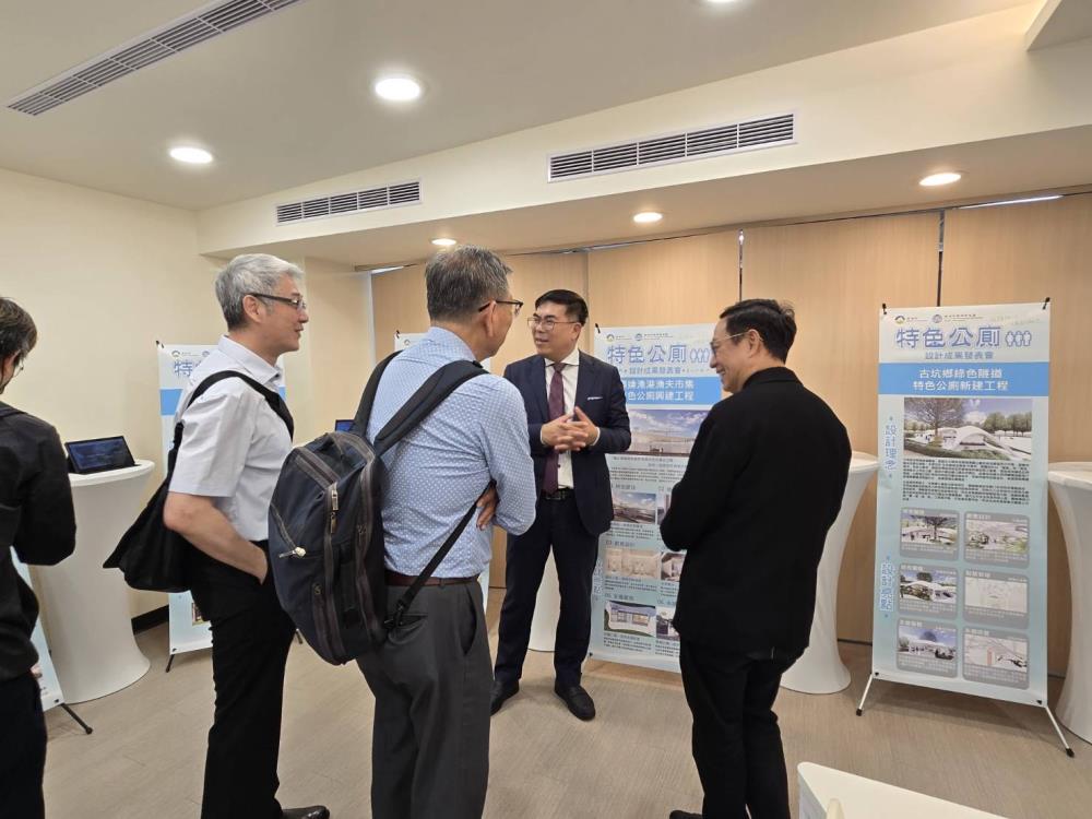 Figure 2: Minister inspecting the distinctive public restroom exhibition