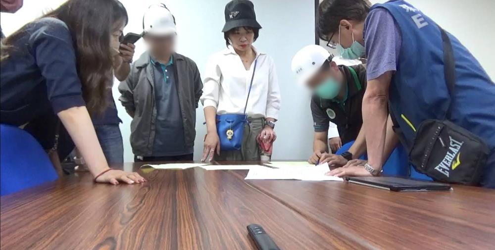 Figure 2: Prosecutors lead a search of a waste disposal company.