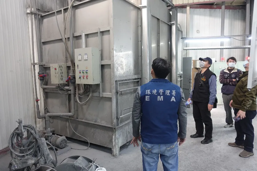 Figure 3: Task force confirming operation of pollution control equipment